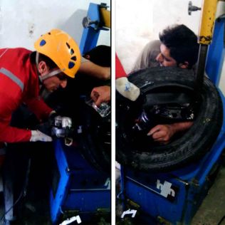 آتش نشانی نیشابور - رهاسازی دست یک همشهری از بین دستگاه آپاراتی و لاستیک خودرو