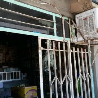 آتش نشانی نیشابور - آتش کینه توزی افراد ناشناس در مغازه سوپر مارکت